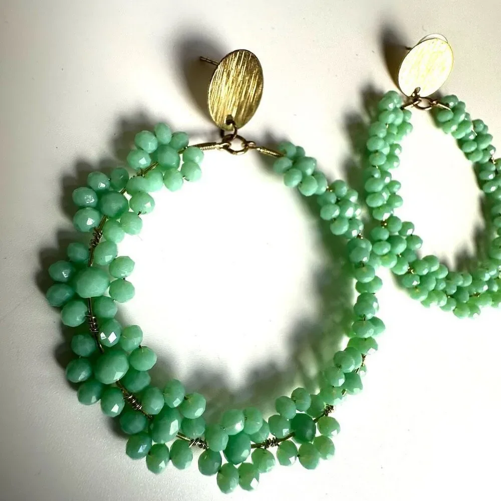 Large green floral circle statement earrings